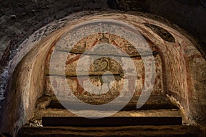 Beautiful shot of a painting in Catacombs of San Gennaro, Rione SanitÃÂ , Naples, Italy photo